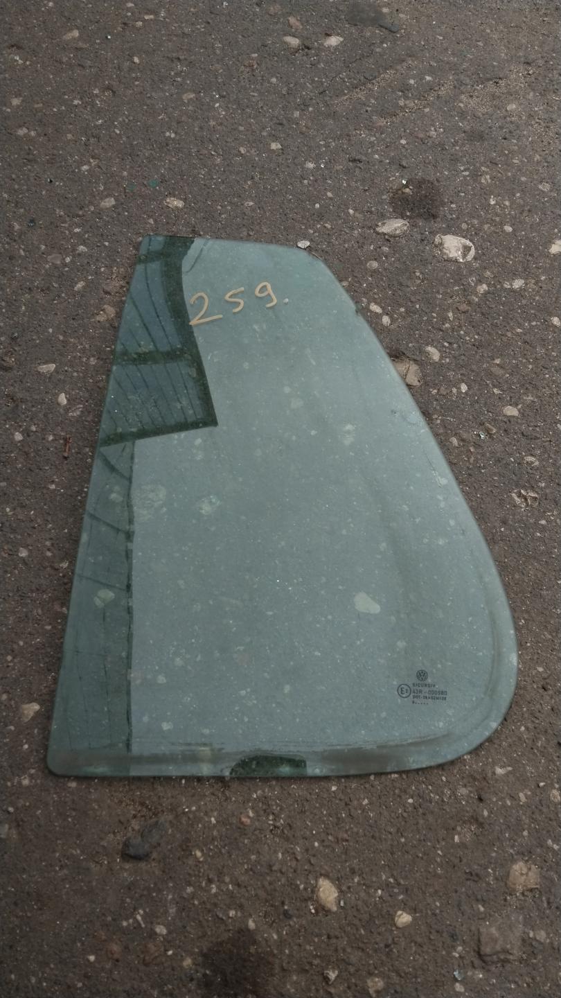Стекло двери задней левой